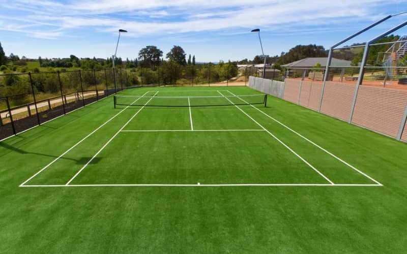 thi-cong-san-tennis-co-nhan-tao (2) thi công sân tennis cỏ nhân tạo